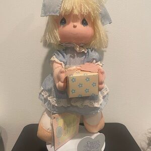 Precious Moments Blond Girl Doll in Light Blue Dress Holding Gift